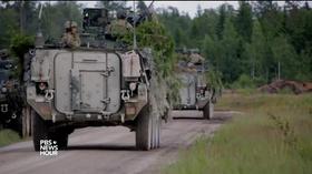 Video thumbnail: PBS NewsHour Eyeing Russia, NATO troops drill for war on a Cold-War scale