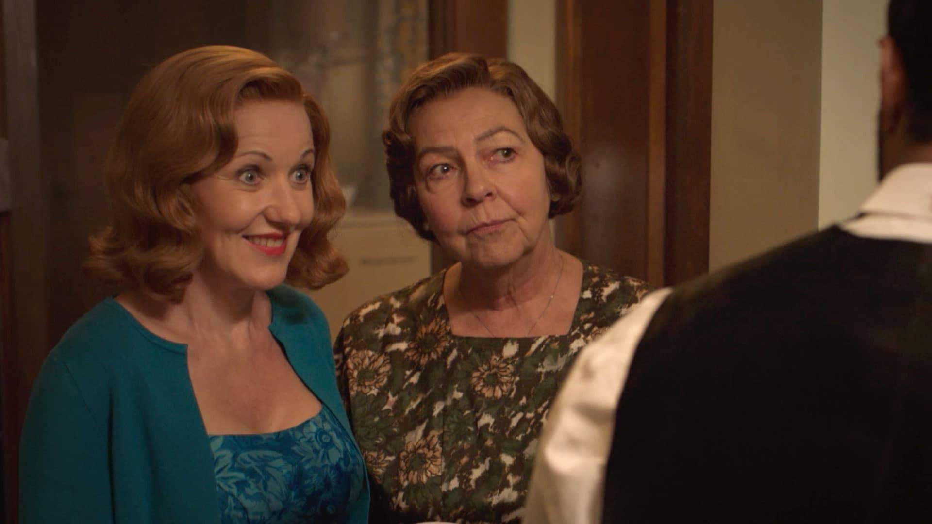 Mrs. C. and Cathy push Alphy to answer a phone call that he seems to be avoiding.