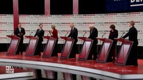 Video thumbnail: PBS NewsHour Candidates answer, would you ask forgiveness or give a gift?
