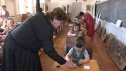 Today’s students learn history in one-room schoolhouse