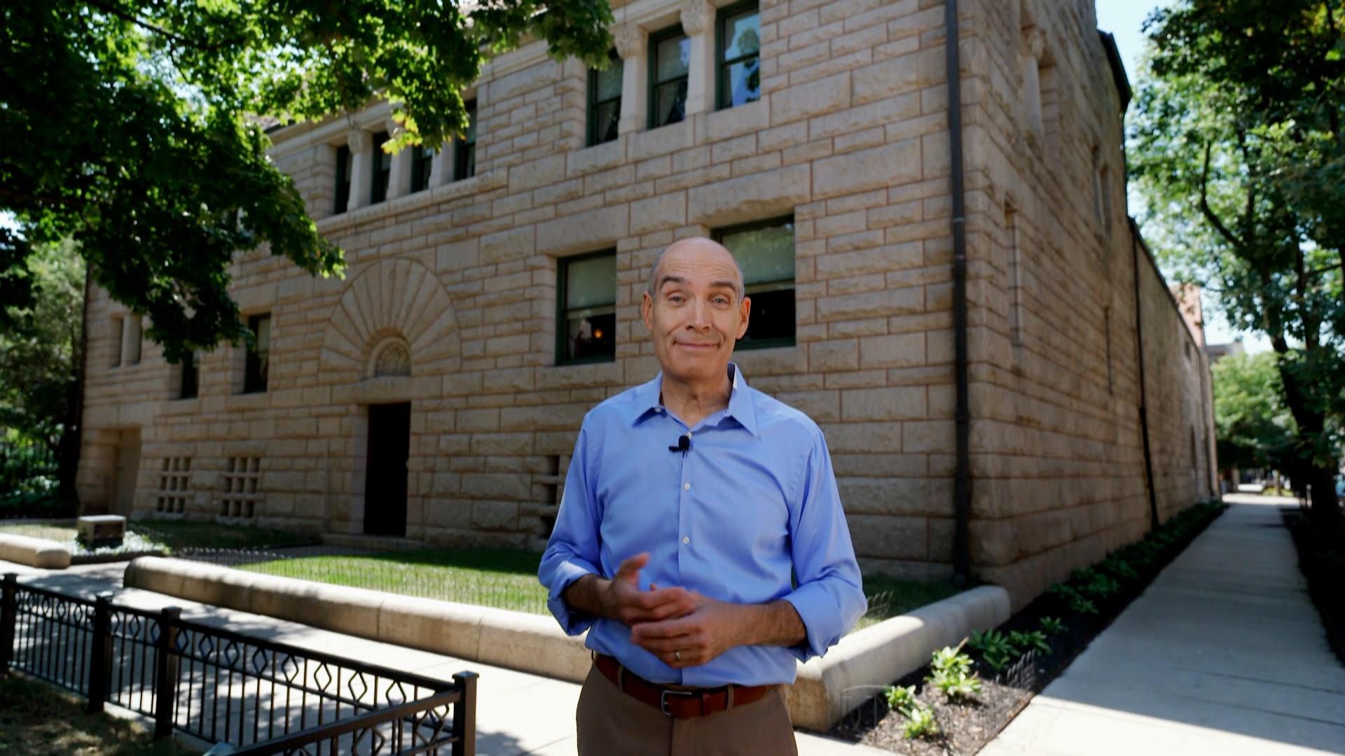 Geoffrey Baer standing in front of The Glessner House