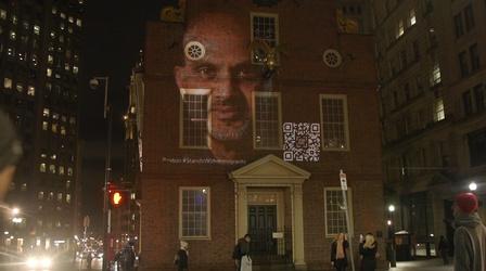 Video thumbnail: PBS NewsHour Landscape-sized portraits of immigrants light up Boston