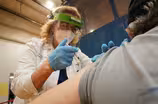 Why many health care workers are delaying vaccinations