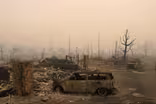 Wildfires turn Northern California neighborhoods to ashes