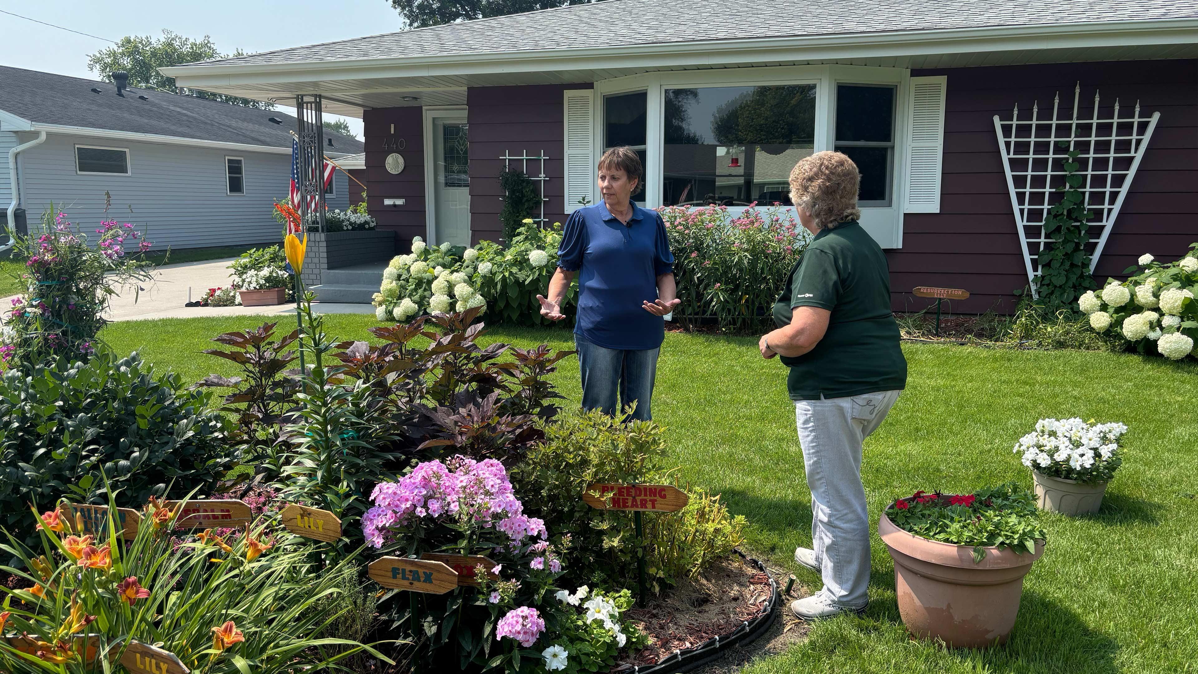 This garden is a neighborhood treasure, featuring flowers, vegetables, and a Little Free Library.