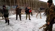 Ukranians are training in civil defense, just in case