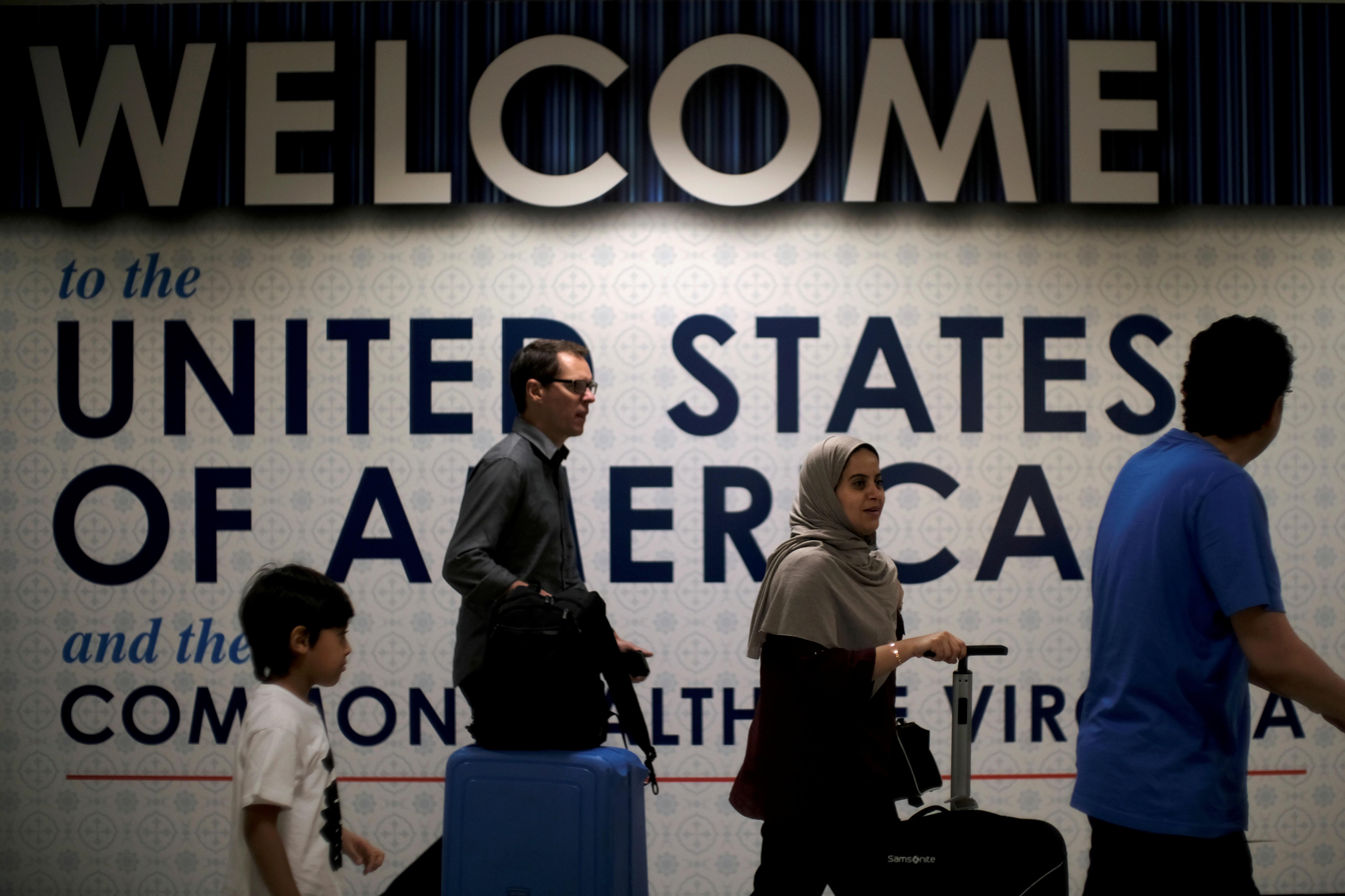 News Wrap: Trump travel ban blocked by federal judge