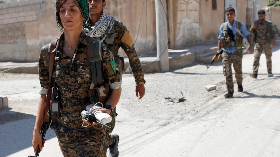 Fighting ISIS, Kurds seek chance to govern themselves image