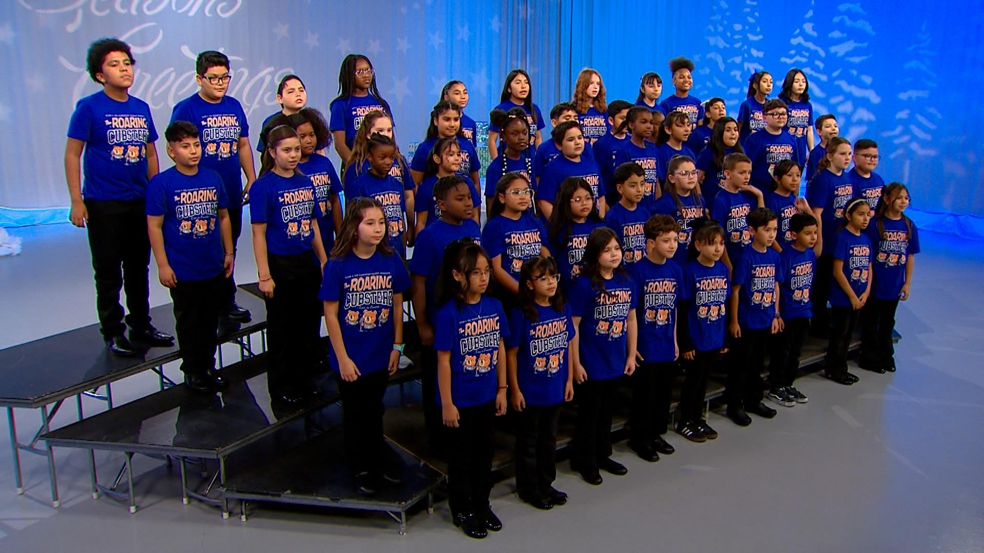 Students from Clyde C. Cox Elementary School perform Ooey-Gooey Cinnamon Bun.