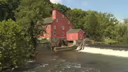 What makes the Red Mill Museum Village a fan favorite?