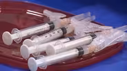 Blacks, Latinos lagging behind others on vaccine acceptance