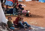 In besieged Idlib, young Syrians hope Trump can save them