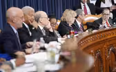Lawmakers battle over impeachment in contentious markup