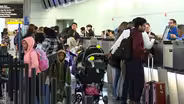 NJ residents join in record Thanksgiving travel