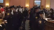 Jersey City swears in new police class, touts drop in crime