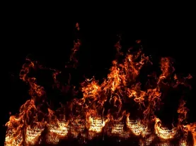 Why Fires Move Faster Up a Hill than Down