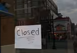 News Wrap: Relentless surge in infections forces layoffs