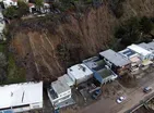 News Wrap: Floods and mudslides threaten Calif. communities