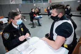 Why U.S. police, firefighters are fighting vaccine mandates
