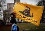 News Wrap: Texas judge blocks federal vaccine mandate