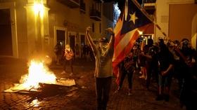 Video thumbnail: PBS NewsHour News Wrap: Police and protesters clash in Puerto Rico