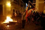 News Wrap: Police and protesters clash in Puerto Rico
