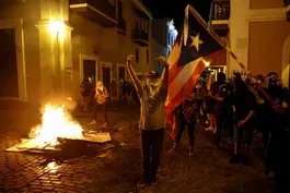 News Wrap: Police and protesters clash in Puerto Rico