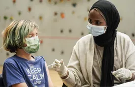News Wrap: WH says 900,000 kids got COVID shot in first week