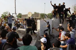 Political infighting in Iraq prompts protests, instability