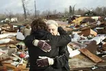 Tornado survivors face freezing temperatures, power outages
