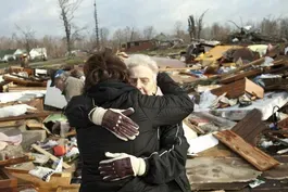 Tornado survivors face freezing temperatures, power outages