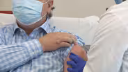 COVID-19 vaccines vs 2D virus surge at nursing homes