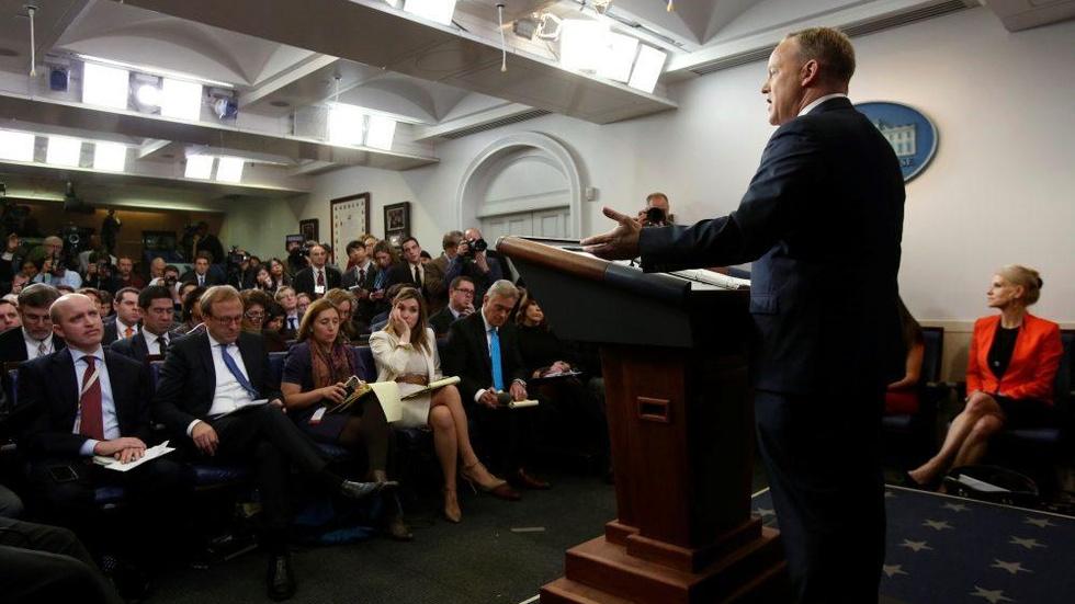 Resignations add to turmoil as Trump team weighs options image