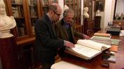 Franco Maria Ricci shows Geoffrey Baer an original 1818 Bodoni Manual of Typography