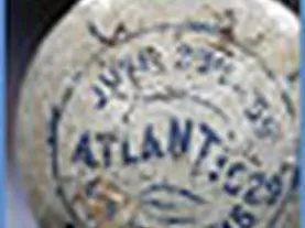 An 1859 Baseball: What Do the Numbers Mean?